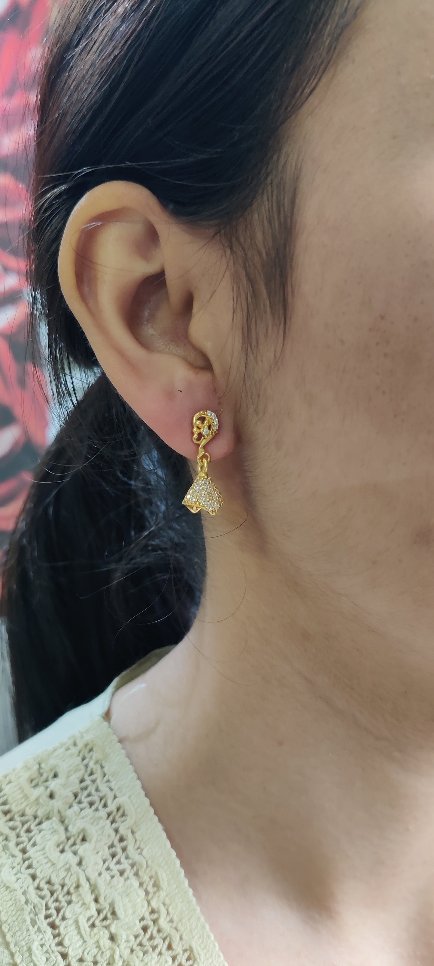 Golden Grace: Pure Silver Jhumkas with a Luxurious Touch