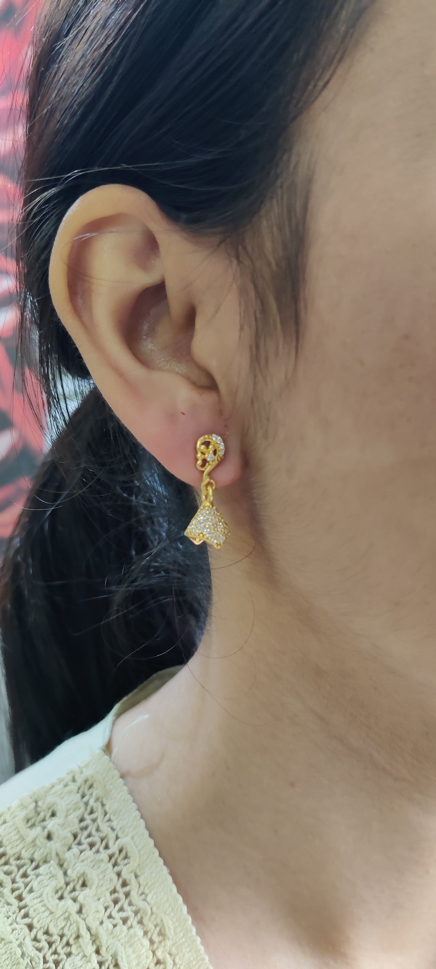 Golden Grace: Pure Silver Jhumkas with a Luxurious Touch