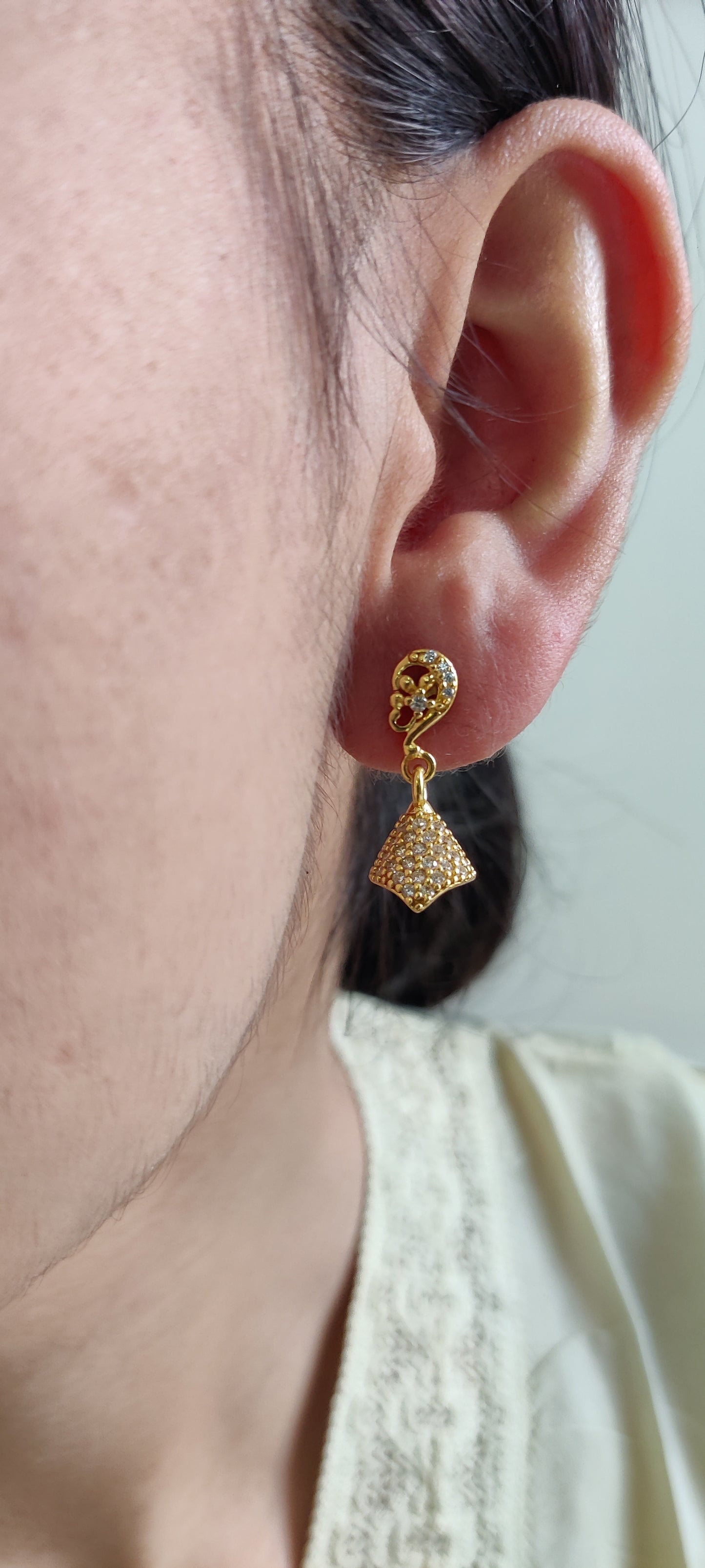 Golden Grace: Pure Silver Jhumkas with a Luxurious Touch
