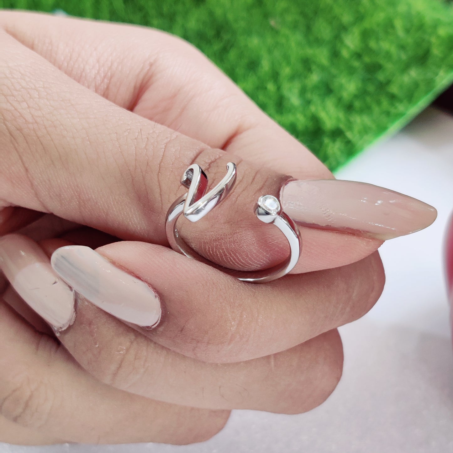 Name Initial Ring, crafted in pure silver and adorned with a sparkling stone