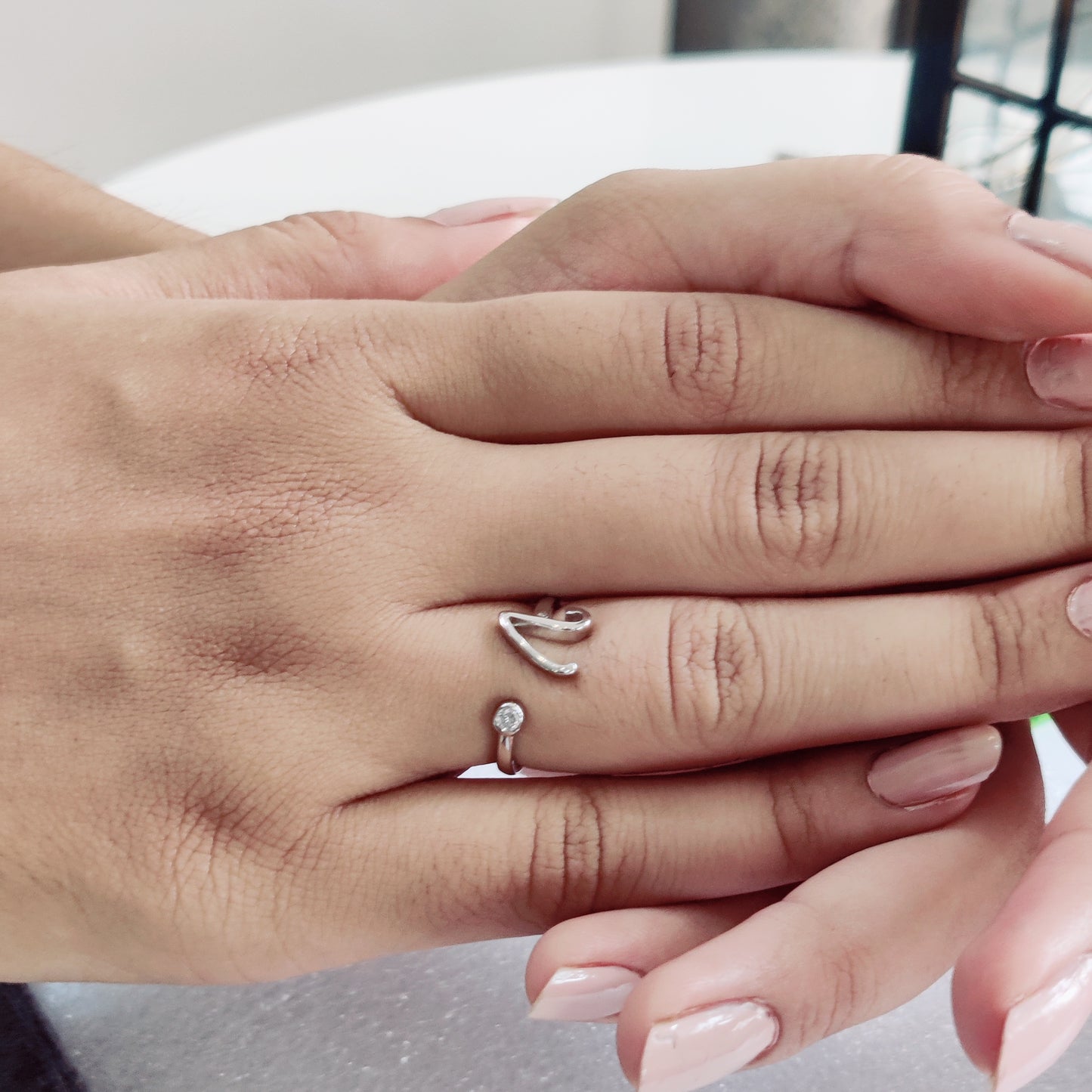 Name Initial Ring, crafted in pure silver and adorned with a sparkling stone