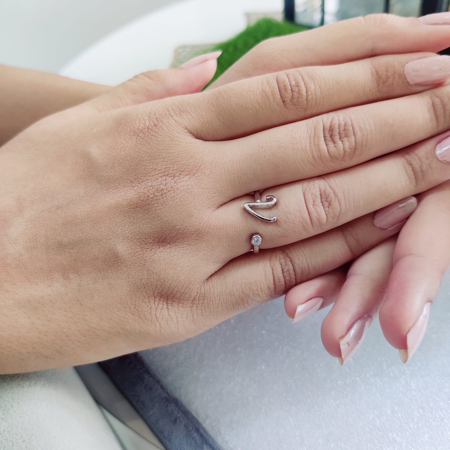 Name Initial Ring, crafted in pure silver and adorned with a sparkling stone