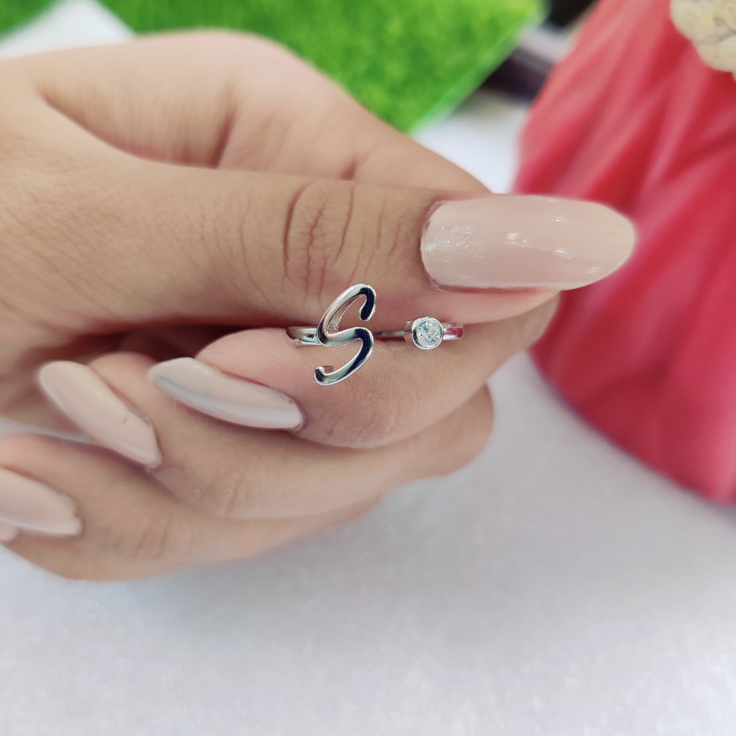 Name Initial Ring, crafted in pure silver and adorned with a sparkling stone