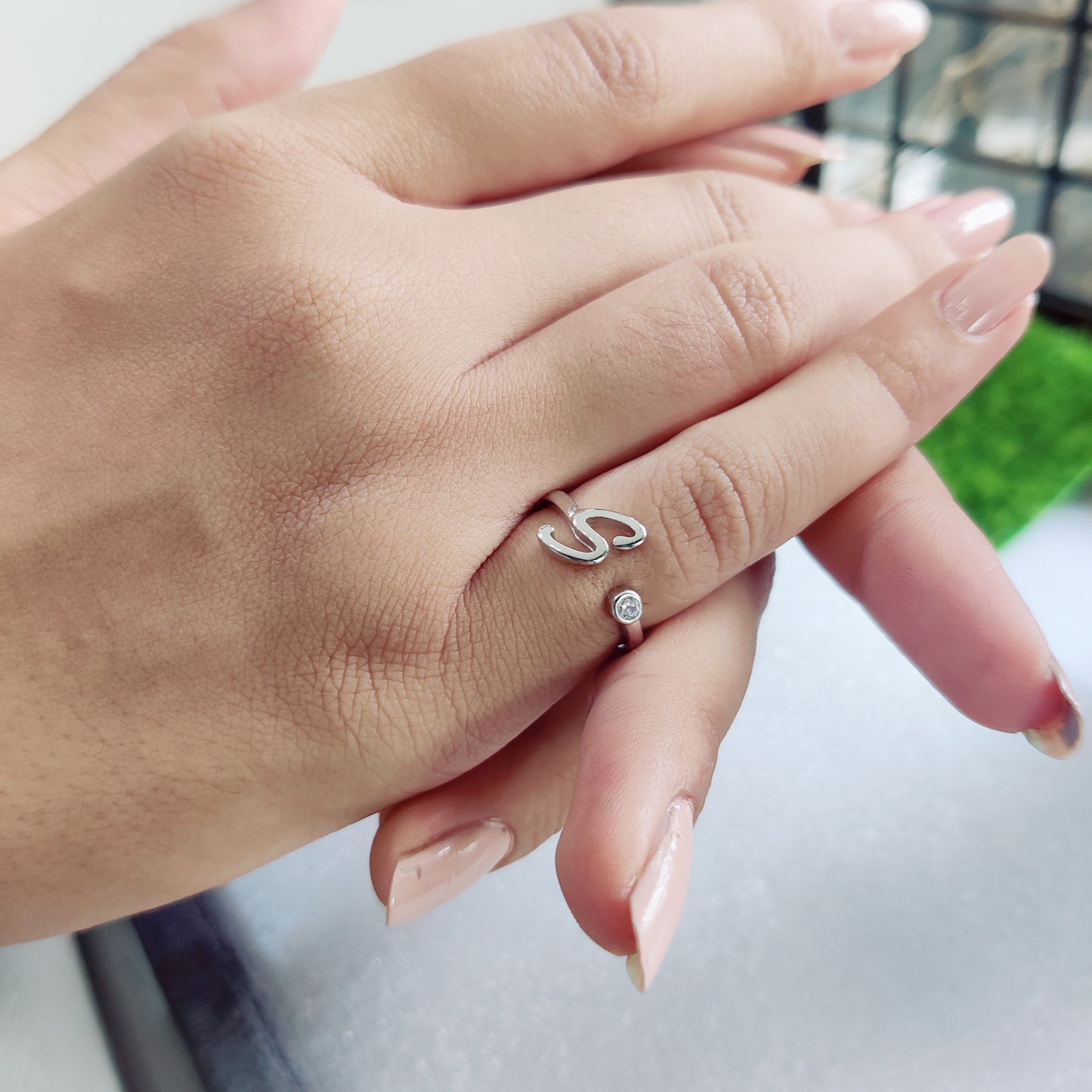 Name Initial Ring, crafted in pure silver and adorned with a sparkling stone