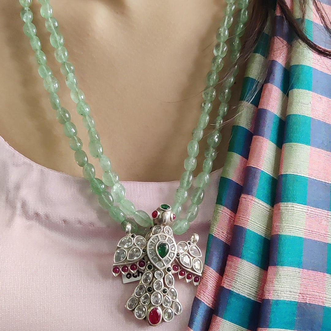 Bird Stone Pendant . Elevate Your Style with Grace