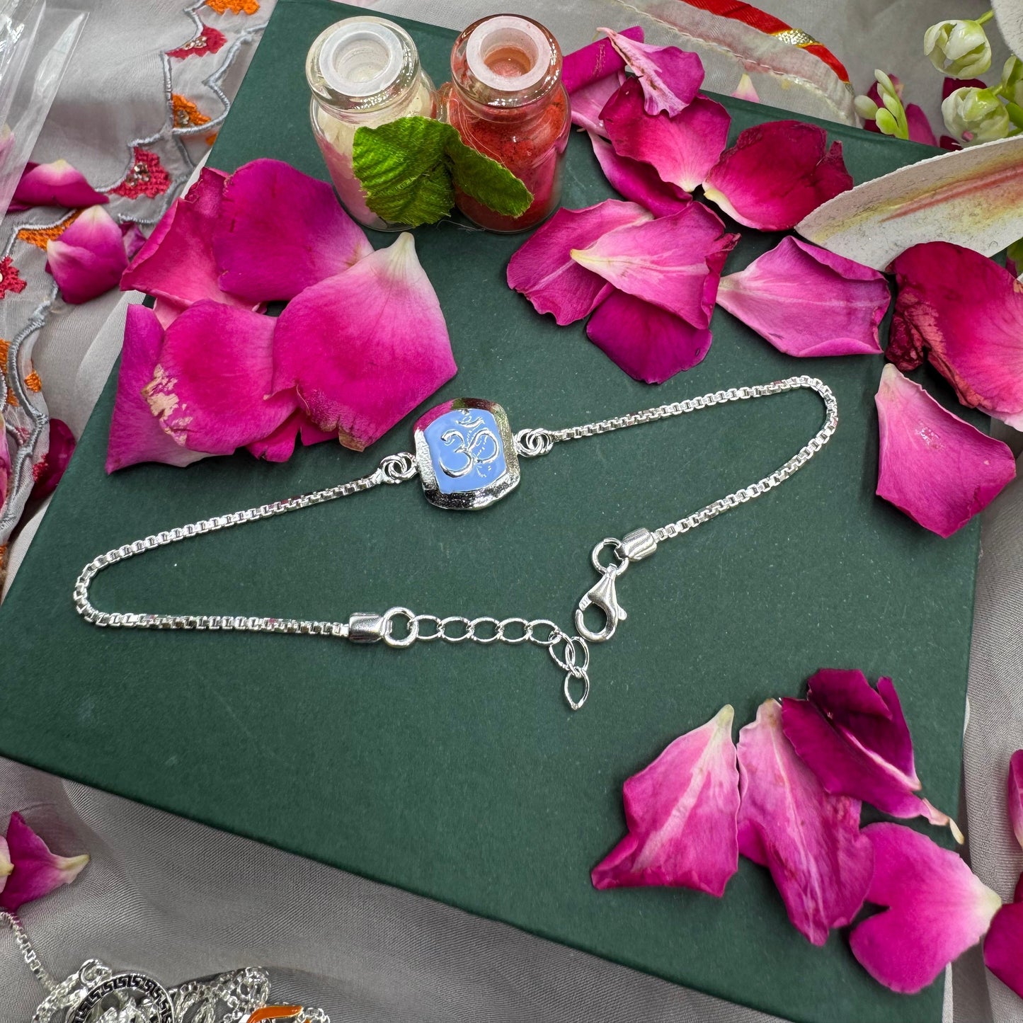 Tranquil Om Silver Rakhi