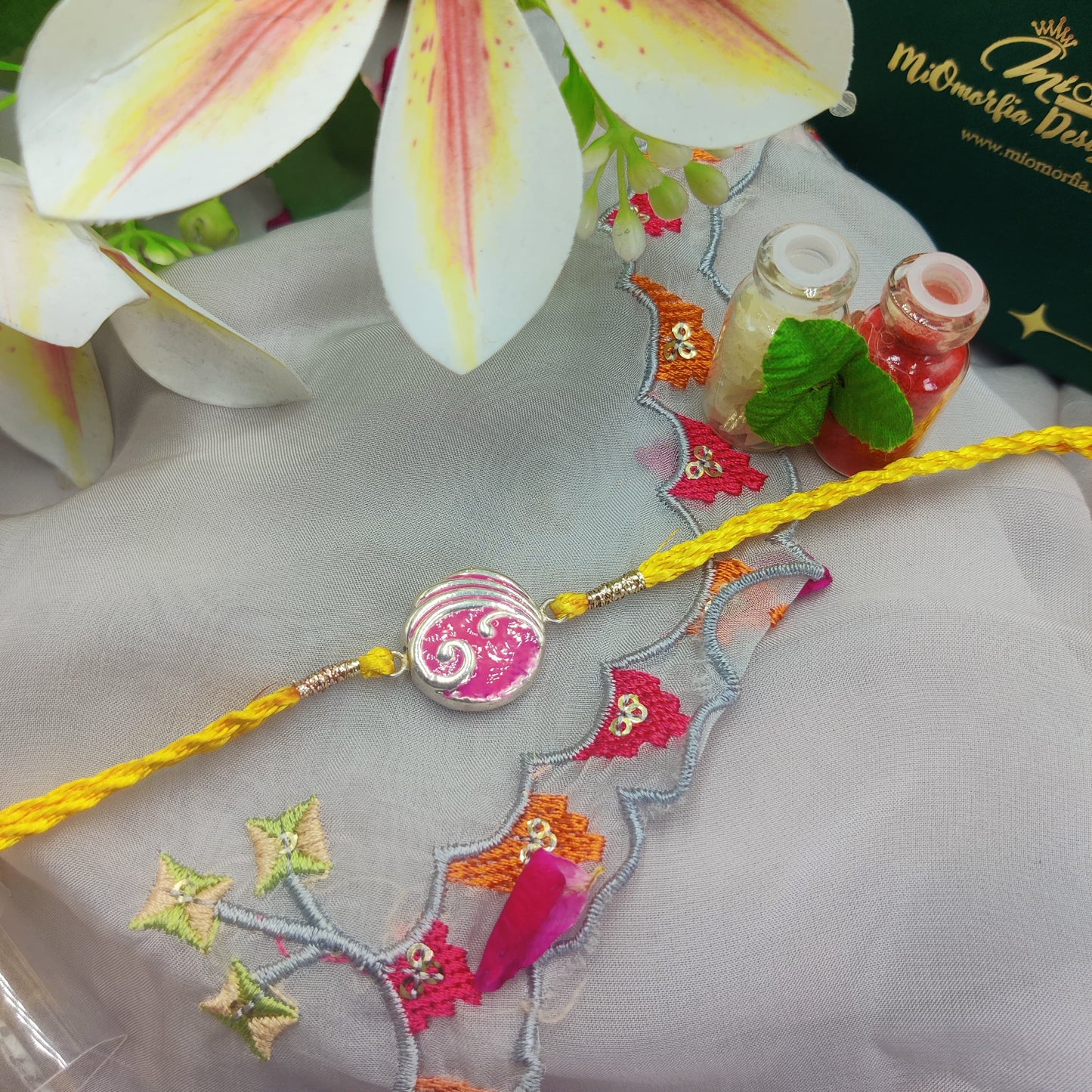 Wave of Grace silver Rakhi