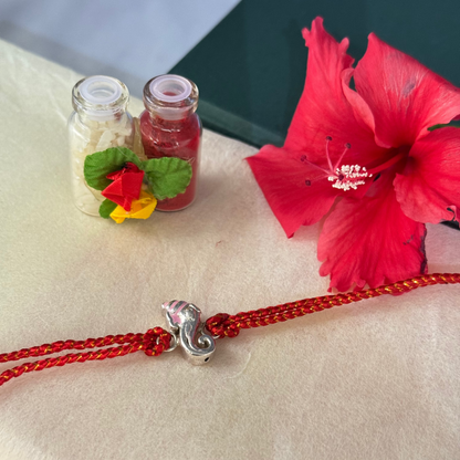 Divya Vinayak – Enamel Ganpati Rakhi in 999 Pure Silver