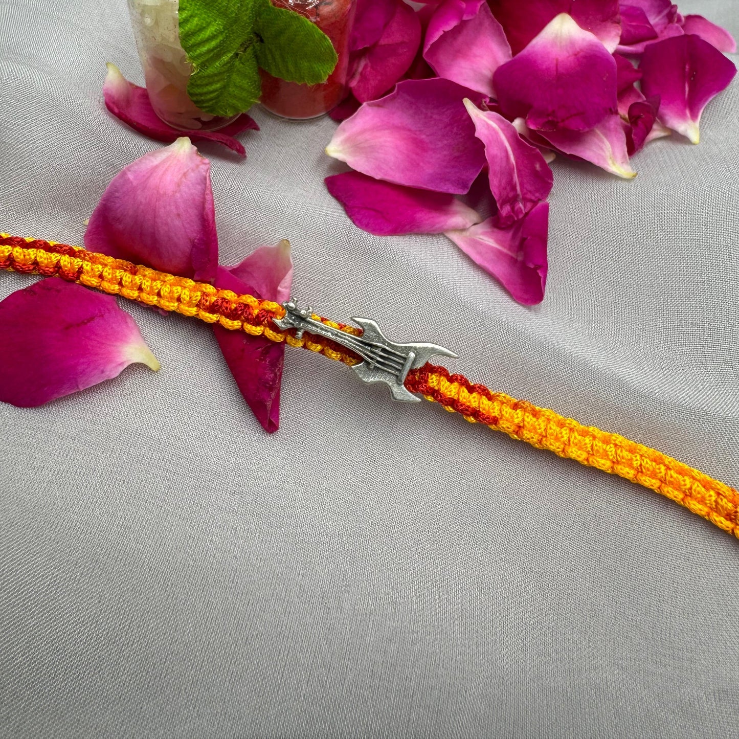 Melody Bond Silver Rakhi