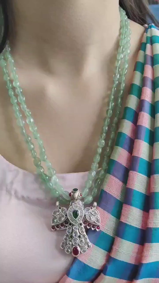 Bird Stone Pendant . Elevate Your Style with Grace